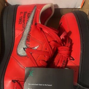 Nike Red Sneakers with Silver Accents